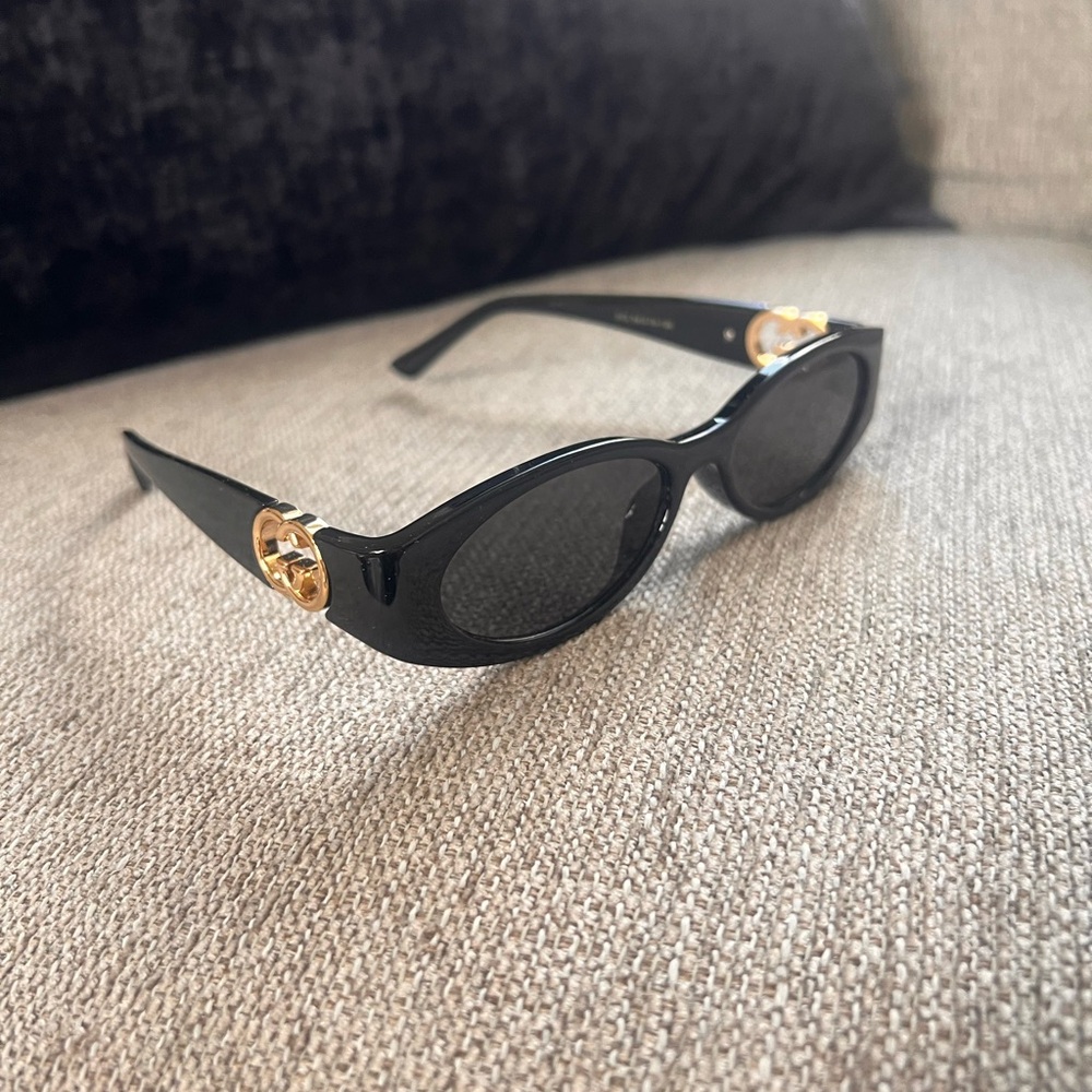 Gucci Hailey GG1660S oval-frame Black Sunglasses with Gold Details